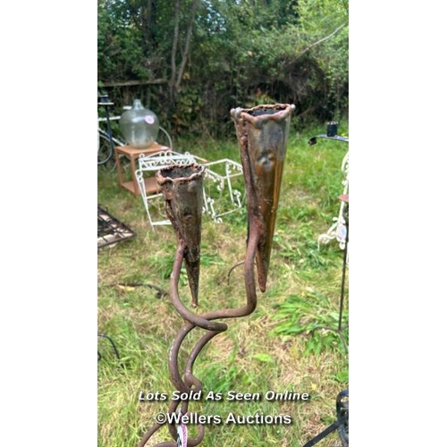 185 - Two arm wrought iron candle holder stand, 82cm (h) / Please bring equipment and labour to assist wit... 