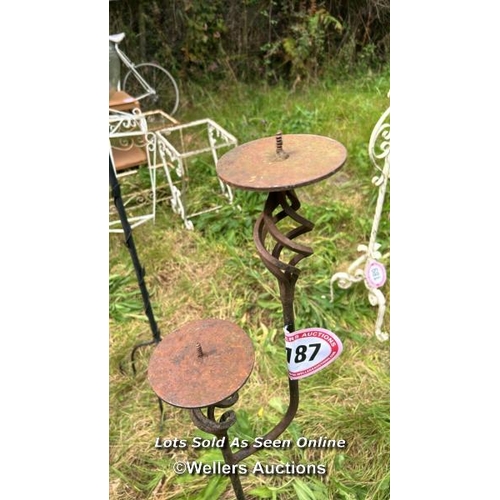 187 - Two arm wrought iron candle holder, 110cm (h) / Please bring equipment and labour to assist with rem... 