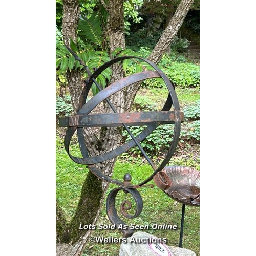 19 - Wraught iron armillary on stone plinth, 140cm (h) and associated stone / Please bring equipment and ... 