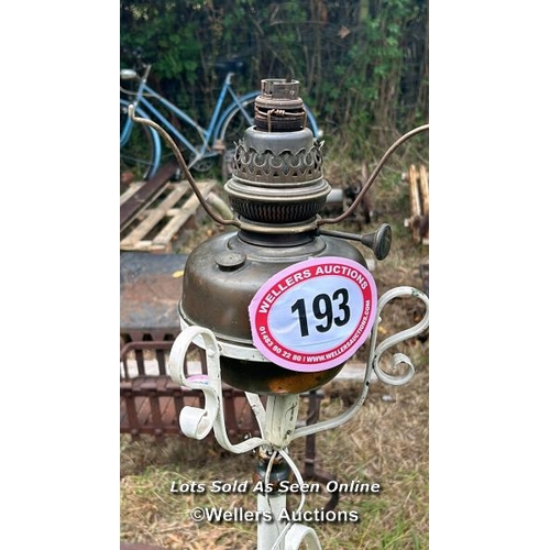 193 - Oil lamp and stand, 134cm (h) / Please bring equipment and labour to assist with removal of all lots... 