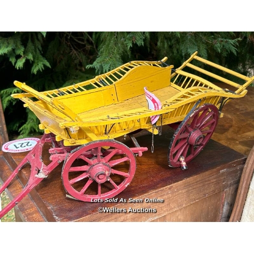 222 - A miniature model horsedrawn hay wagon, 24cm (h) x 75cm (l) / Please bring equipment and labour to a... 