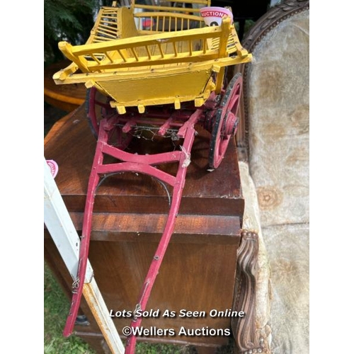 222 - A miniature model horsedrawn hay wagon, 24cm (h) x 75cm (l) / Please bring equipment and labour to a... 