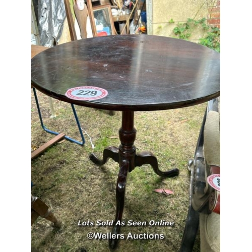 229 - A 18th century Georgian mahogany tripod table on pad feet, 76cm (h) x 76cm (dia) / Please bring equi... 