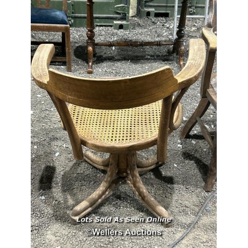 261 - A bentwood revolving chair with cane seat, 82cm (h) x 62cm (w) x 47cm (d) / Please bring equipment a... 