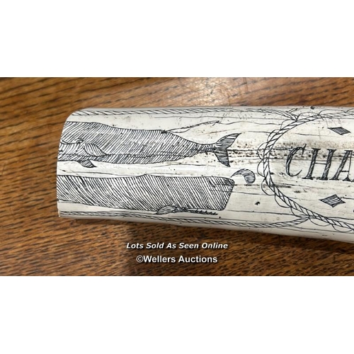 270 - A resin scrimshaw, with the writing 'Charles.W.Morgan New Bedford' / Please bring equipment and labo... 