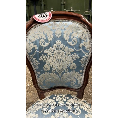 283 - A c.1850's mahogany framed French style dining chair with upholstered floralette seat and back, on c... 