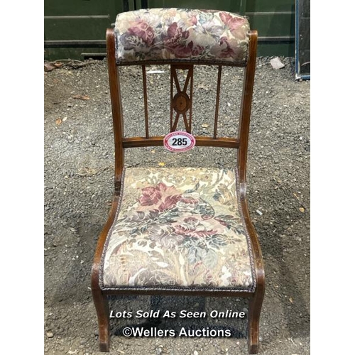 285 - A Victorian mahogany Sheraton revival nursing chair with upholstered floralette seat and head rest, ... 