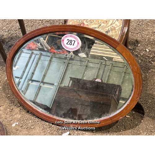 287 - c.1900's oval shaped bevelled mirror in mahogany frame, 55cm (h) x 79cm (w) / Please bring equipment... 