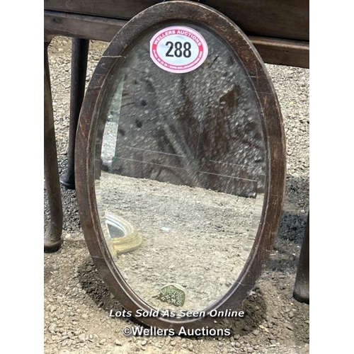 288 - c.1930's oval shaped bevelled mirror in oak frame, 67cm (h) x 42cm (w) / Please bring equipment and ... 