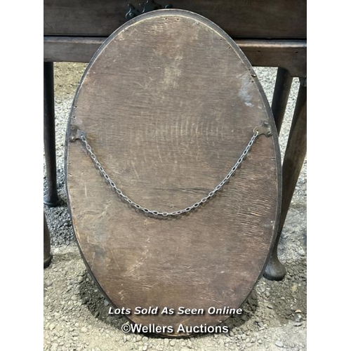 288 - c.1930's oval shaped bevelled mirror in oak frame, 67cm (h) x 42cm (w) / Please bring equipment and ... 