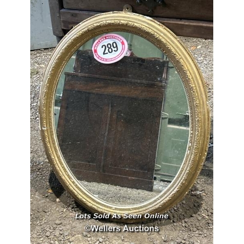 289 - A 19th century oval shaped mirror in giltwood frame, 65cm (h) x 53cm (d) / Please bring equipment an... 