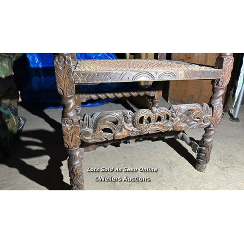 298 - A Carolean style carver chair, possibly walnut, profusely carved with barley twist sides, crowns and... 