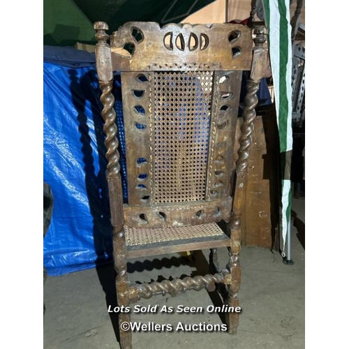 298 - A Carolean style carver chair, possibly walnut, profusely carved with barley twist sides, crowns and... 