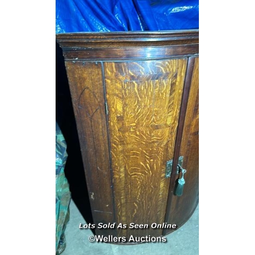 299 - A Sheraton period oak bowfront corner cupboard with mahogany cross banding and ebonised inlay, 103cm... 