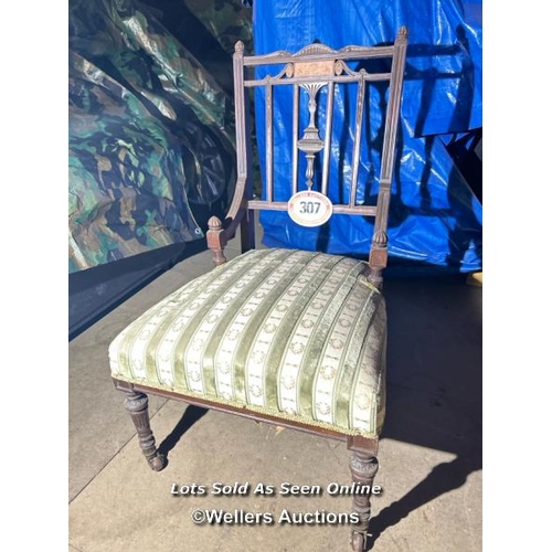 307 - A 1900's Sheraton revival nursing chair with upholstered seat on original casters, 77cm (h) x 48cm (... 