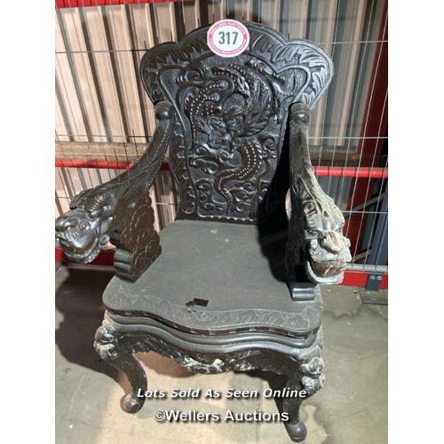 317 - A heavily carved oriental chair, 102cm (h) x 56cm (w) x 43cm (d) / Please bring equipment and labour... 