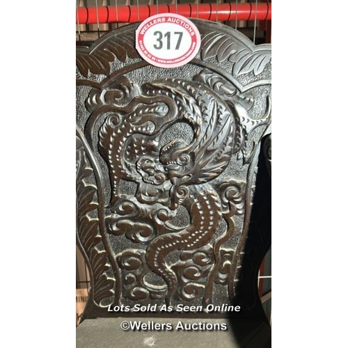 317 - A heavily carved oriental chair, 102cm (h) x 56cm (w) x 43cm (d) / Please bring equipment and labour... 