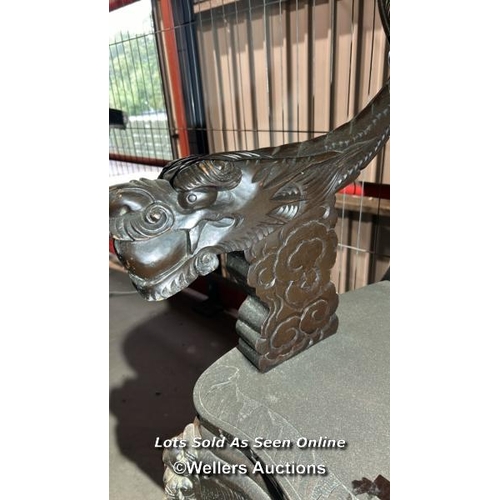 317 - A heavily carved oriental chair, 102cm (h) x 56cm (w) x 43cm (d) / Please bring equipment and labour... 