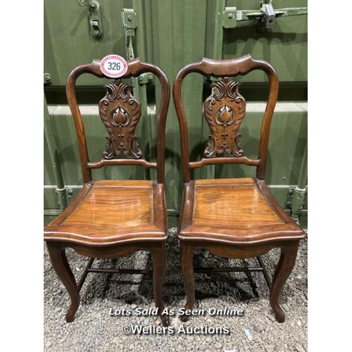 326 - A pair of Chinese rosewood chairs with carved back, 93cm (h) x 42cm (w) x 39cm (d) / Please bring eq... 