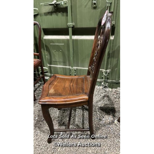 326 - A pair of Chinese rosewood chairs with carved back, 93cm (h) x 42cm (w) x 39cm (d) / Please bring eq... 