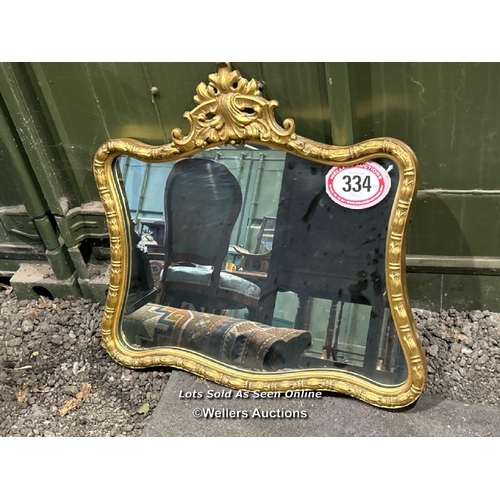 334 - A 1950's guilt framed mirror, 52cm (h) x 62cm (w) / Please bring equipment and labour to assist with... 