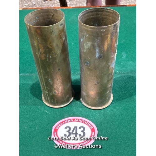 343 - A pair of German brass shell casings, both marked 1916, 23cm (h) / Please bring equipment and labour... 