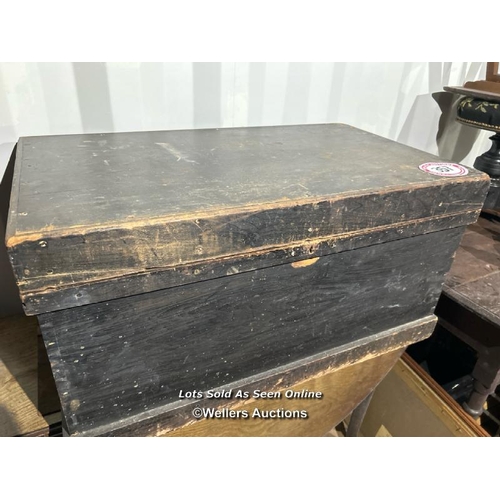 357 - A Victorian ebonised pine trunk with iron handles, 43cm (h) x 86cm (w) x 60cm (d) / Please bring equ... 