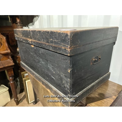 357 - A Victorian ebonised pine trunk with iron handles, 43cm (h) x 86cm (w) x 60cm (d) / Please bring equ... 