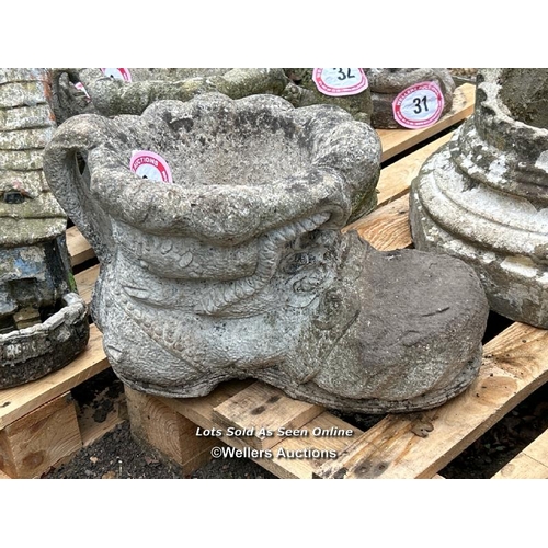 38 - Reconstituted stone boot statue, 28cm (h) / Please bring equipment and labour to assist with removal... 