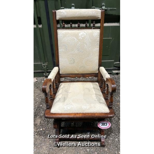 383 - A Victorian American rocking chair with cream floralette upholstered seat and back, 106cm (h) x 56cm... 