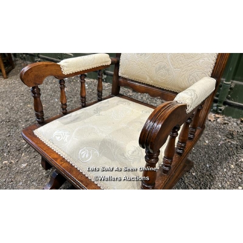 383 - A Victorian American rocking chair with cream floralette upholstered seat and back, 106cm (h) x 56cm... 