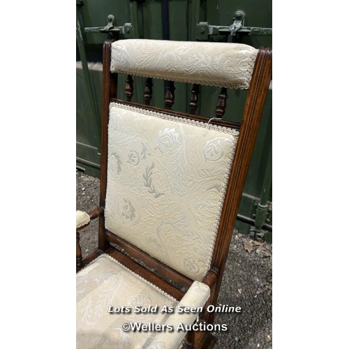 383 - A Victorian American rocking chair with cream floralette upholstered seat and back, 106cm (h) x 56cm... 