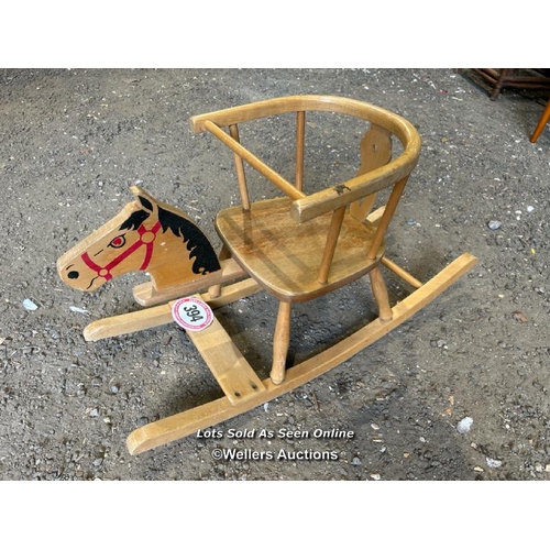 394 - A small wooden rocking horse, 44cm (h) x 82cm (l) x 31cm (w) / Please bring equipment and labour to ... 