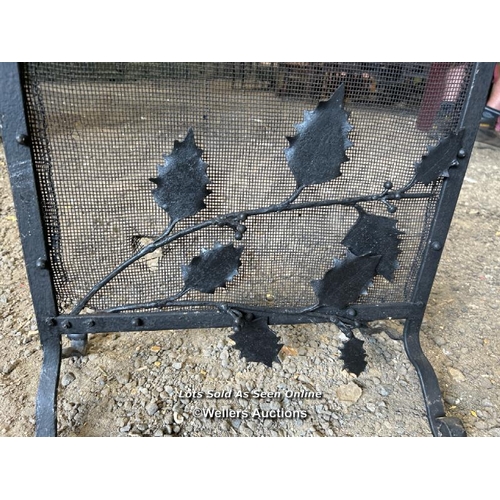 396 - A blacksmith made metal fire guard, 58cm (h) x 47cm (w) / Please bring equipment and labour to assis... 