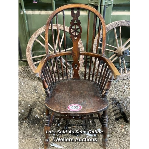 402 - Elm stickback windsor chair, 113cm (h) x 60cm (w) x 50cm (d) / Please bring equipment and labour to ... 