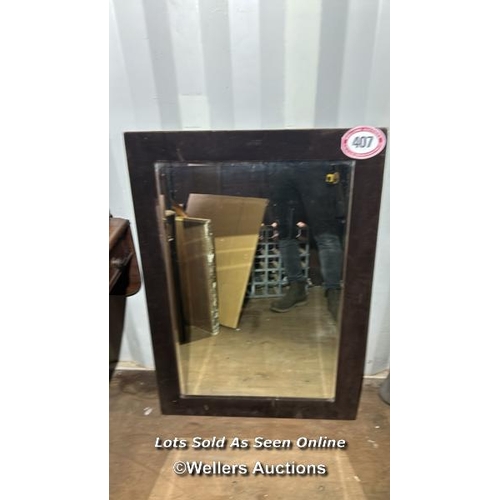 407 - A contemporary bevelled mirror with velvet surround, 88cm (h) x 69cm (w)  / Please bring equipment a... 