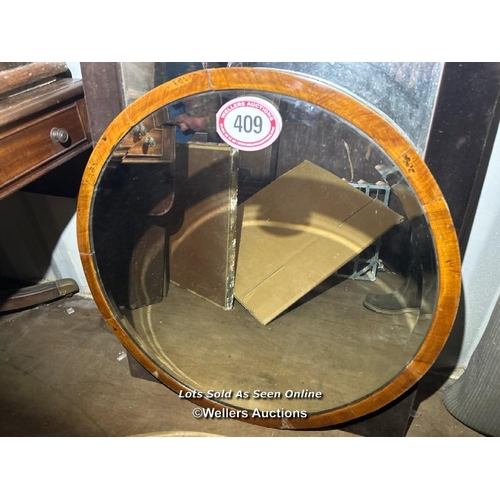 409 - A circular walnut deco bevel edged mirror, 76cm (dia) / Please bring equipment and labour to assist ... 