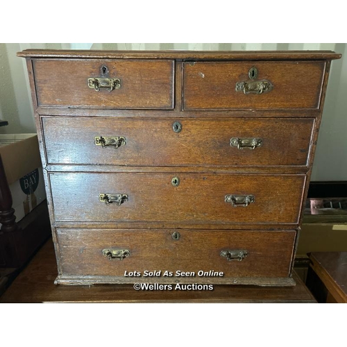 415 - A c.1740's Georgian oak chest of five drawers, handles have been changed, 85cm (h) x 94cm (w) x 52cm... 