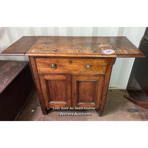 428 - A period drop leaf cupboard with cetral drawer and cupboard underneath, 79cm (h) x 112cm when extend... 