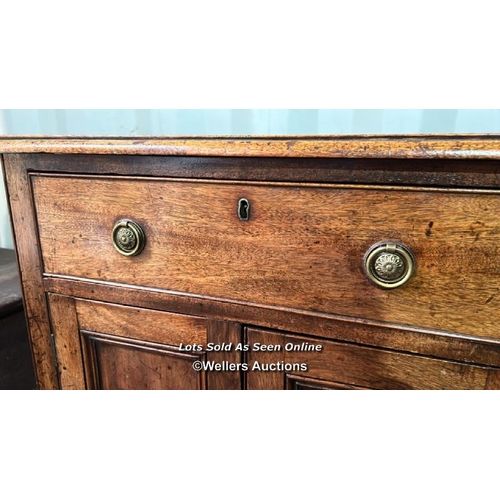 428 - A period drop leaf cupboard with cetral drawer and cupboard underneath, 79cm (h) x 112cm when extend... 