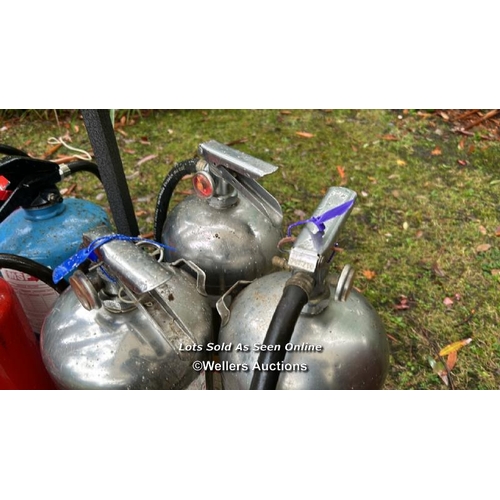 456 - Three steel fire extinguishers / Please bring equipment and labour to assist with removal of all lot... 