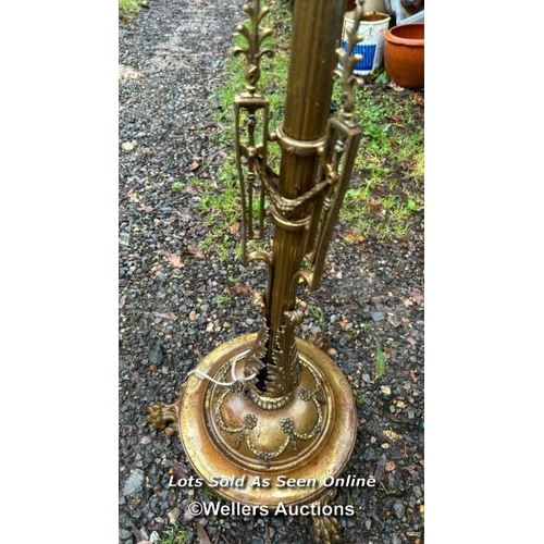 491 - A heavy brass neo-classical standing lamp, 157cm (h) / Please bring equipment and labour to assist w... 