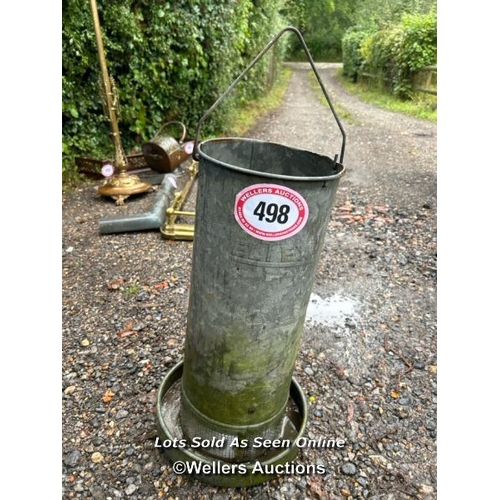 498 - A galvanised feeder, 60cm (h) / Please bring equipment and labour to assist with removal of all lots... 