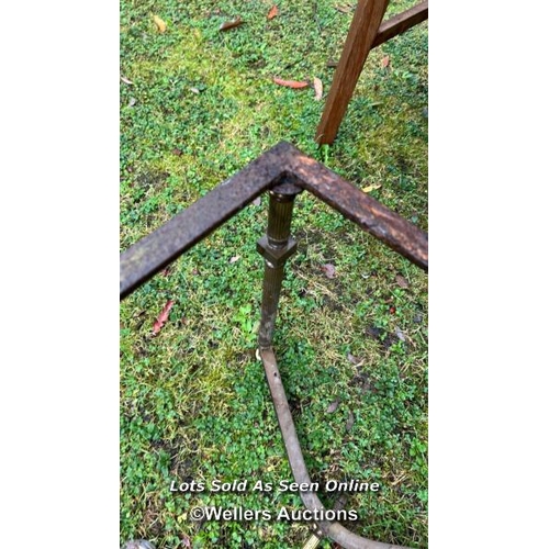 507 - A weathered brass table base, 41cm (h) x 100cm (w) x 49cm (d) / Please bring equipment and labour to... 