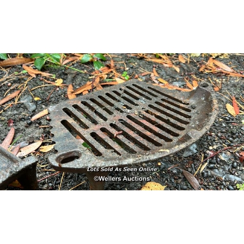 512 - A pair of cast iron firegrates / Please bring equipment and labour to assist with removal of all lot... 