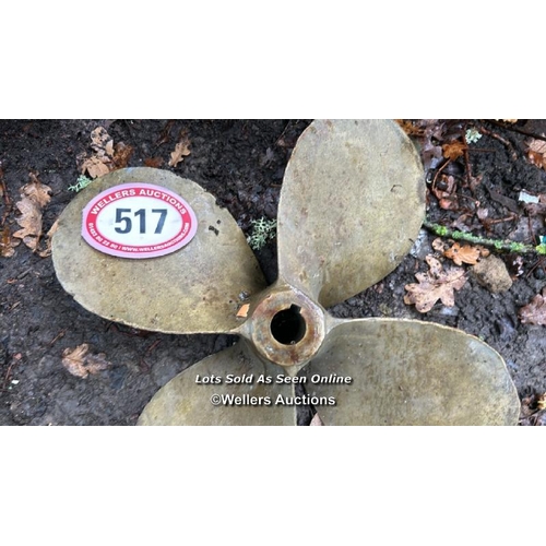 517 - A bronze boat propeller, 48cm (dia) / Please bring equipment and labour to assist with removal of al... 