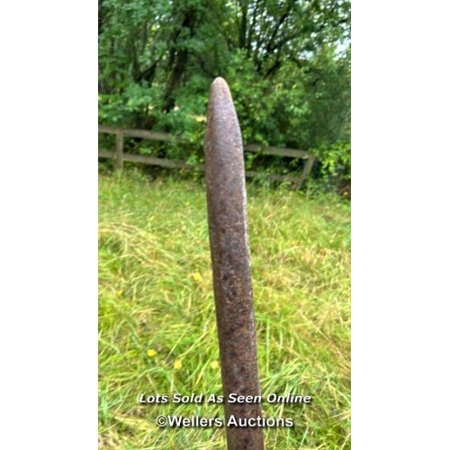 530 - A large iron bar, 168cm long / Please bring equipment and labour to assist with removal of all lots.... 