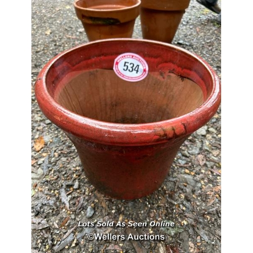 534 - A glazed terracotta pot, 34cm (h) x 40cm (w) / Please bring equipment and labour to assist with remo... 