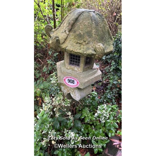 547 - A stone pagoda Japanese style lantern, set into ground and will require excavation, buyer to supply ... 