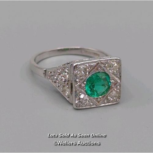 311 - Antique ring of Art Deco design, the central cushion cut emerald surrounded by old cut diamonds pave... 